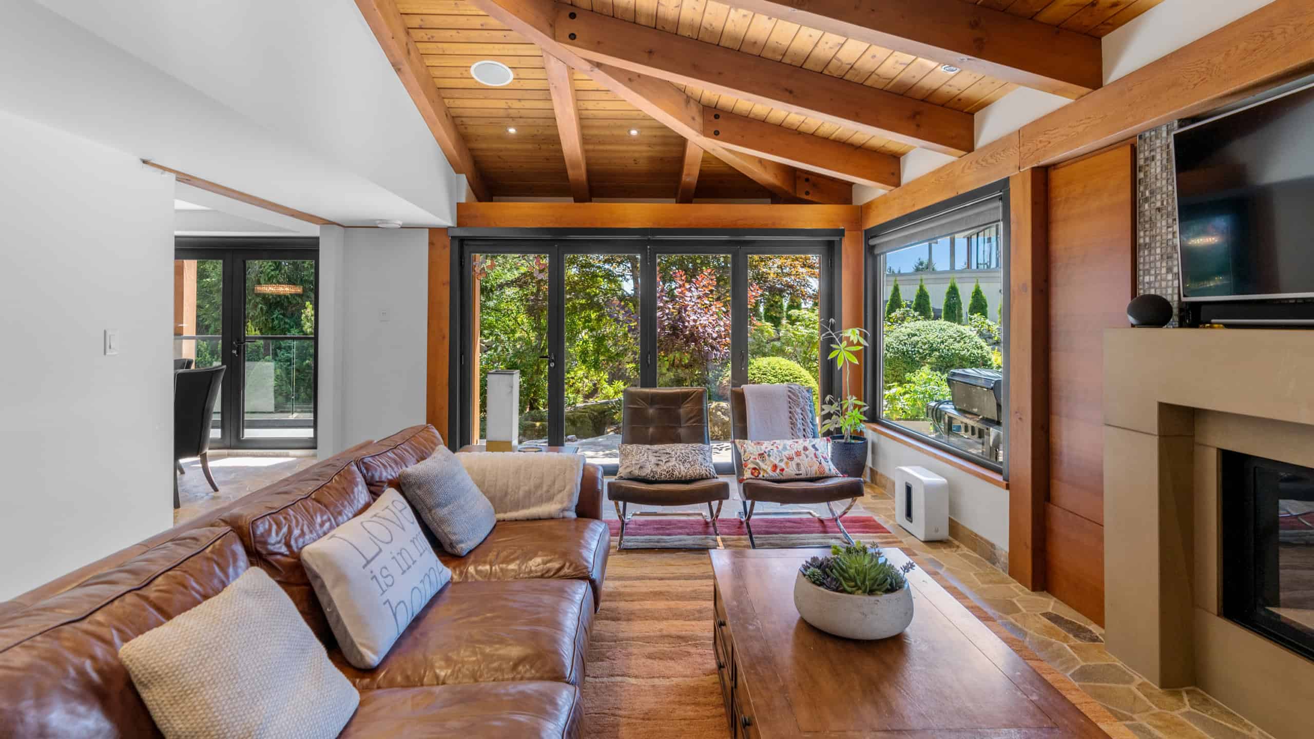 Modern West Vancouver Home Interior Bright living room with large windows and natural light.