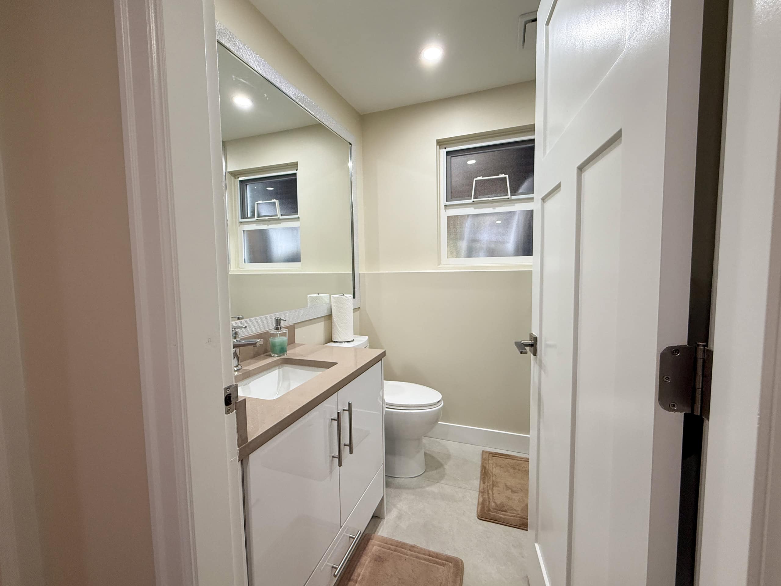 Bright bathroom interior in North Vancouver property listed at 1580 Dempsey Rd.