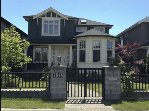 Spacious Vancouver home for sale with modern design, lush garden, and a private yard, ideal for families seeking luxurious real estate in British Columbia.