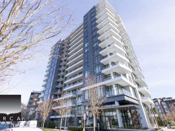Contemporary residential high-rise in Vancouver with spacious balconies and large windows, offering stunning city views.
