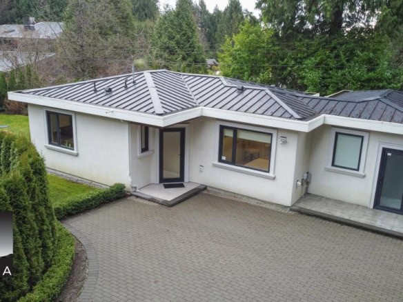 Spacious basement or garden-level suite in West Vancouver, featuring contemporary design, large windows, and private entrance, ideal for comfortable living or rental income.