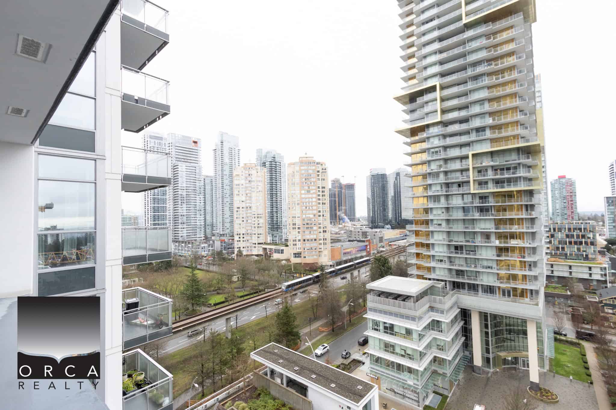 Condo view of downtown Vancouver from 1106-4360 Beresford Street, showcasing high-rise buildings and urban landscape. Perfect for real estate listings and property marketing.