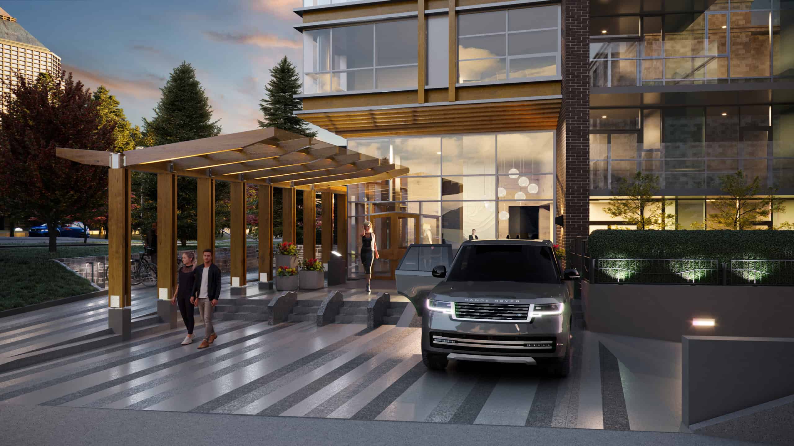 Modern condo building entrance in West Vancouver with sleek design and welcoming ambiance. Features a stylish driveway, outdoor seating, and contemporary architecture.