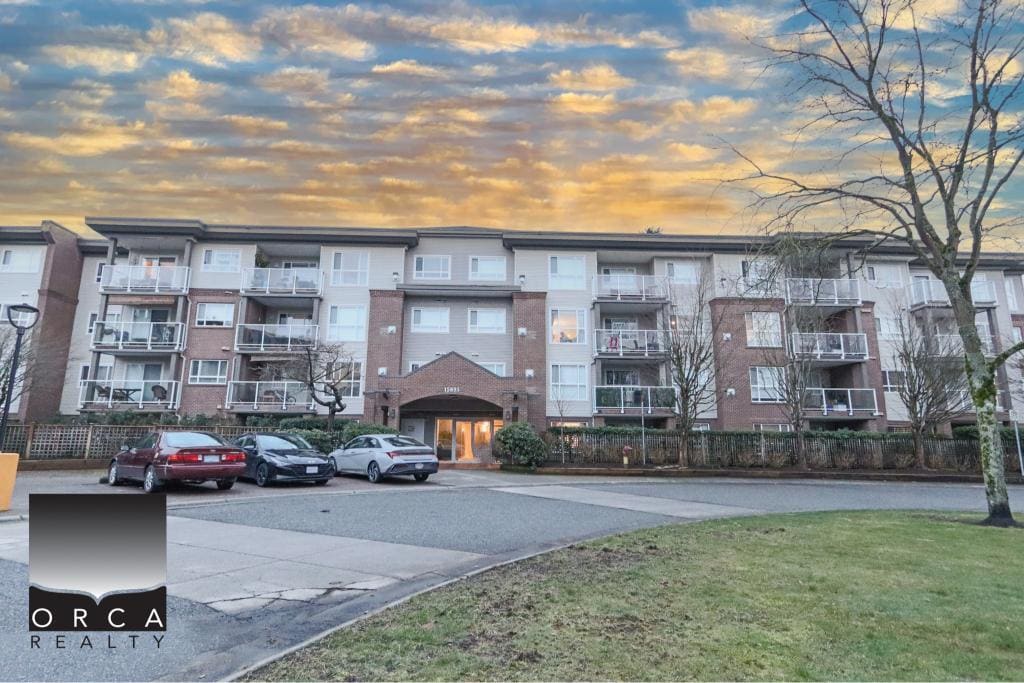 Spacious multi-unit residential complex at 410-15895 84th Ave, Surrey, featuring balconies and parking.