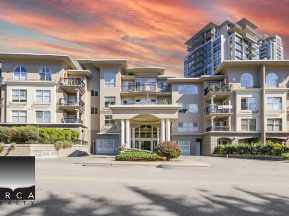 Spacious residential complex in Coquitlam featuring multiple balconies and contemporary architecture, ideal for buyers seeking urban living with scenic views.