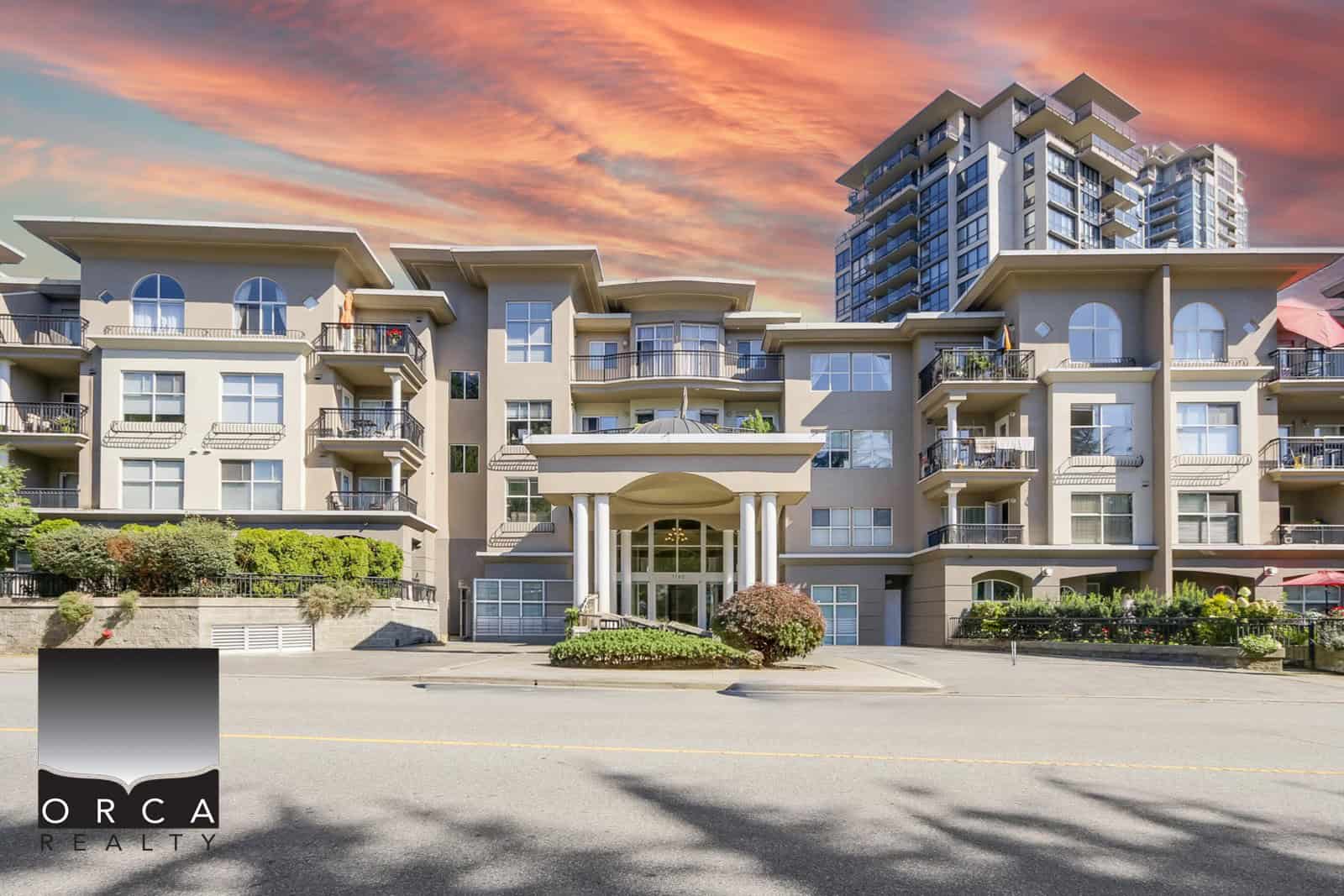 Spacious residential complex in Coquitlam featuring multiple balconies and contemporary architecture, ideal for buyers seeking urban living with scenic views.