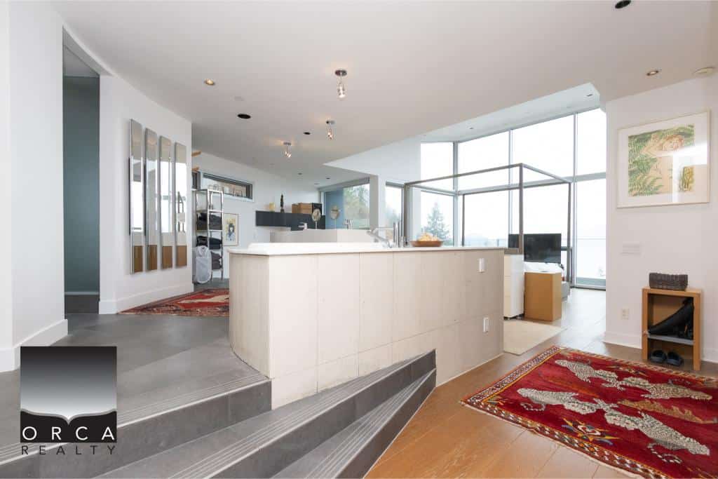 Bright and spacious interior of Ansell Place featuring large windows and contemporary design.