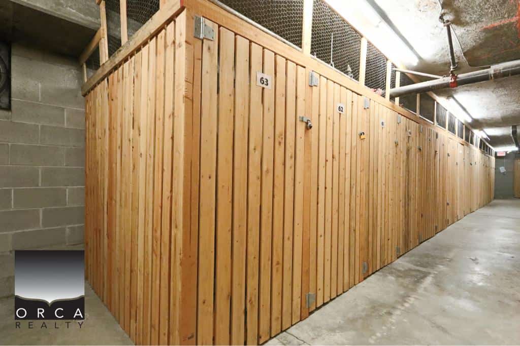 Storage units in Surrey with secure wooden doors, ideal for personal or business use, available at Orca Realty Inc.