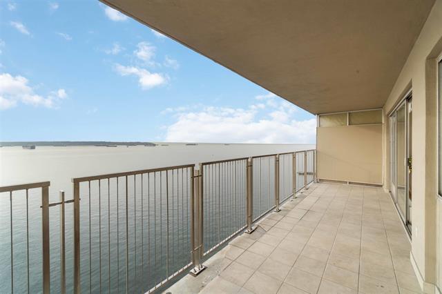 Balcony overlooking the water at 1507-150 24th St, West Vancouver, showcasing stunning ocean views and modern outdoor space.