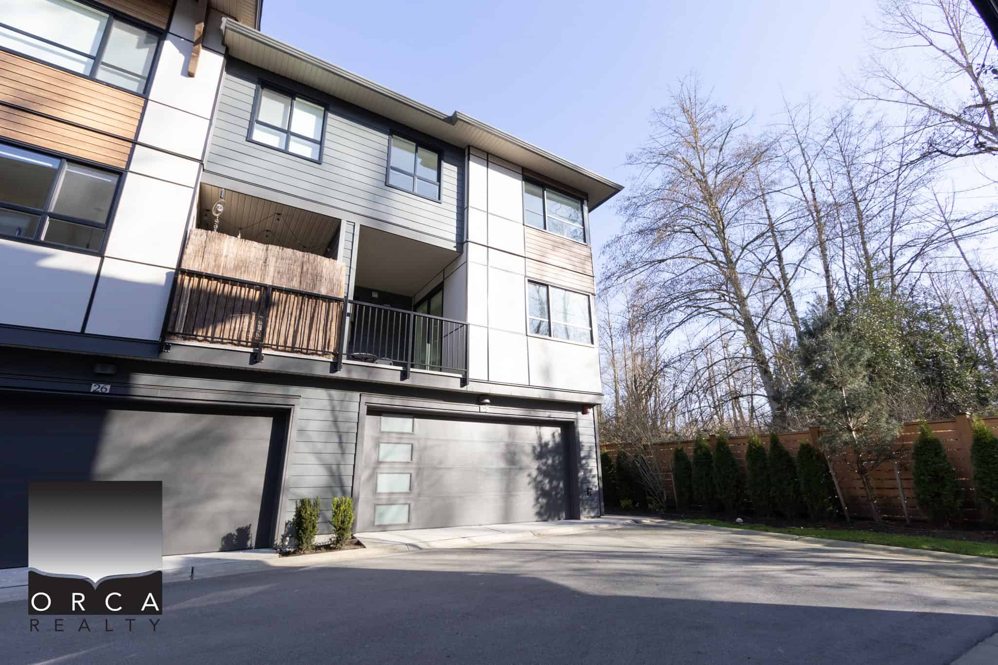 Modern townhouse in Langley with spacious garage and contemporary design.