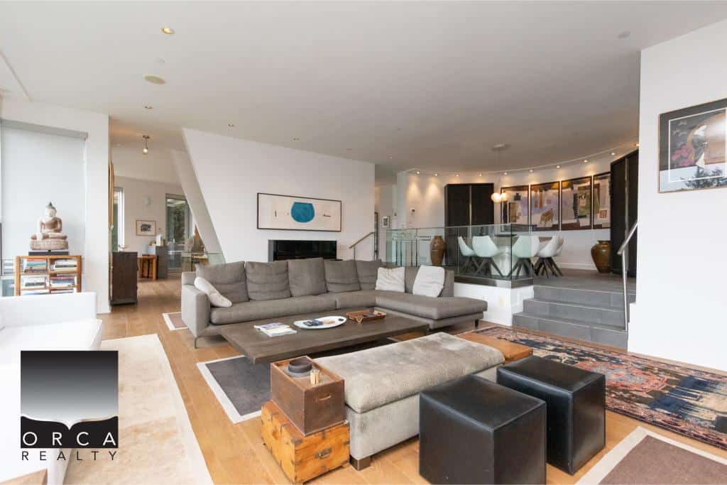 Spacious and stylish living room in Ansell Place, featuring contemporary furniture, a cozy sectional sofa, and elegant decor, perfect for relaxing or entertaining guests.