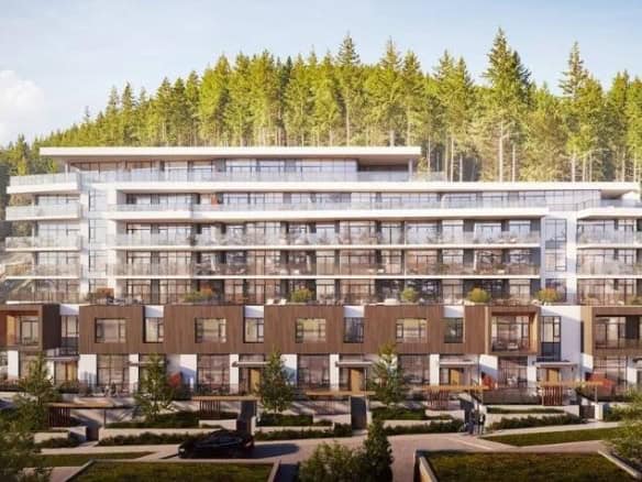 Modern West Vancouver condo complex with lush forest view and contemporary architecture.