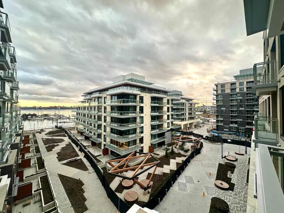 Modern waterfront condo in North Vancouver showcasing contemporary design and scenic views of the harbor.