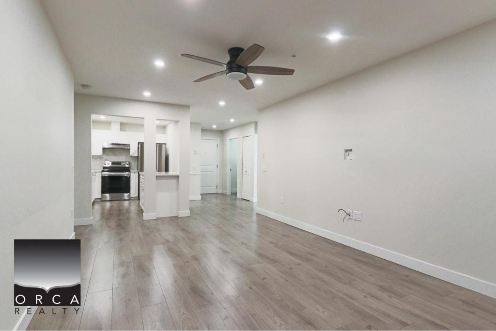 Bright and spacious living area in Surrey with open floor plan and contemporary design. Perfect for comfortable living and entertaining.