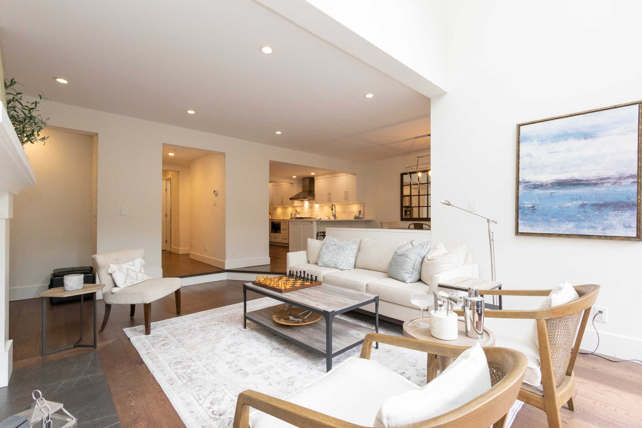 Modern West Vancouver Living Room Bright and airy living room in West Vancouver home with contemporary furniture, large windows, and minimalist decor, showcasing a stylish and comfortable space.