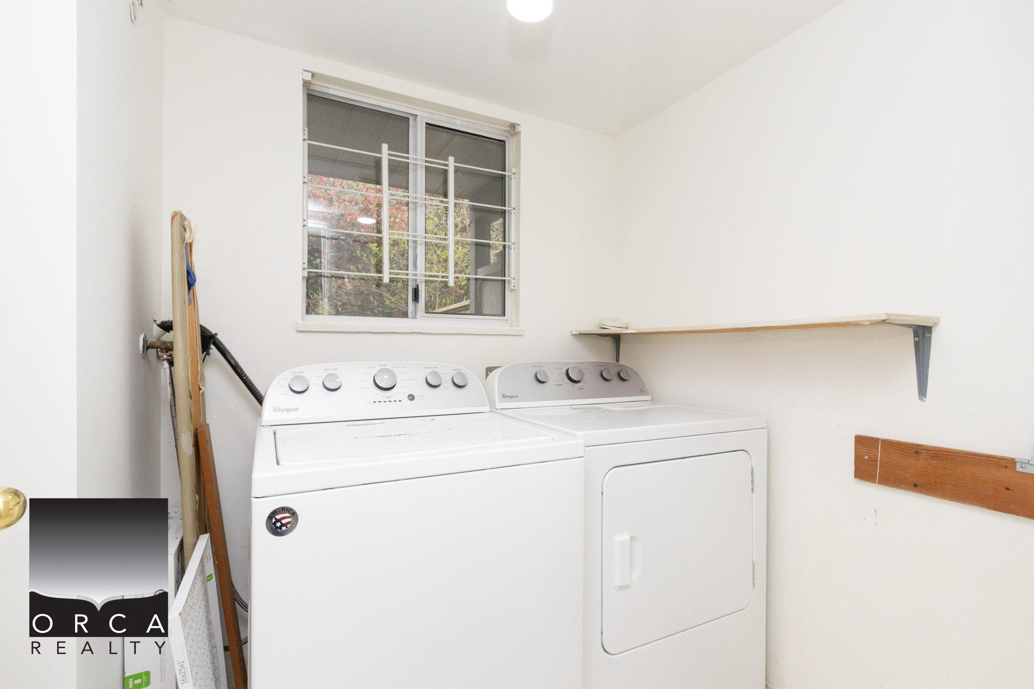 Laundry appliances in a residential laundry room.