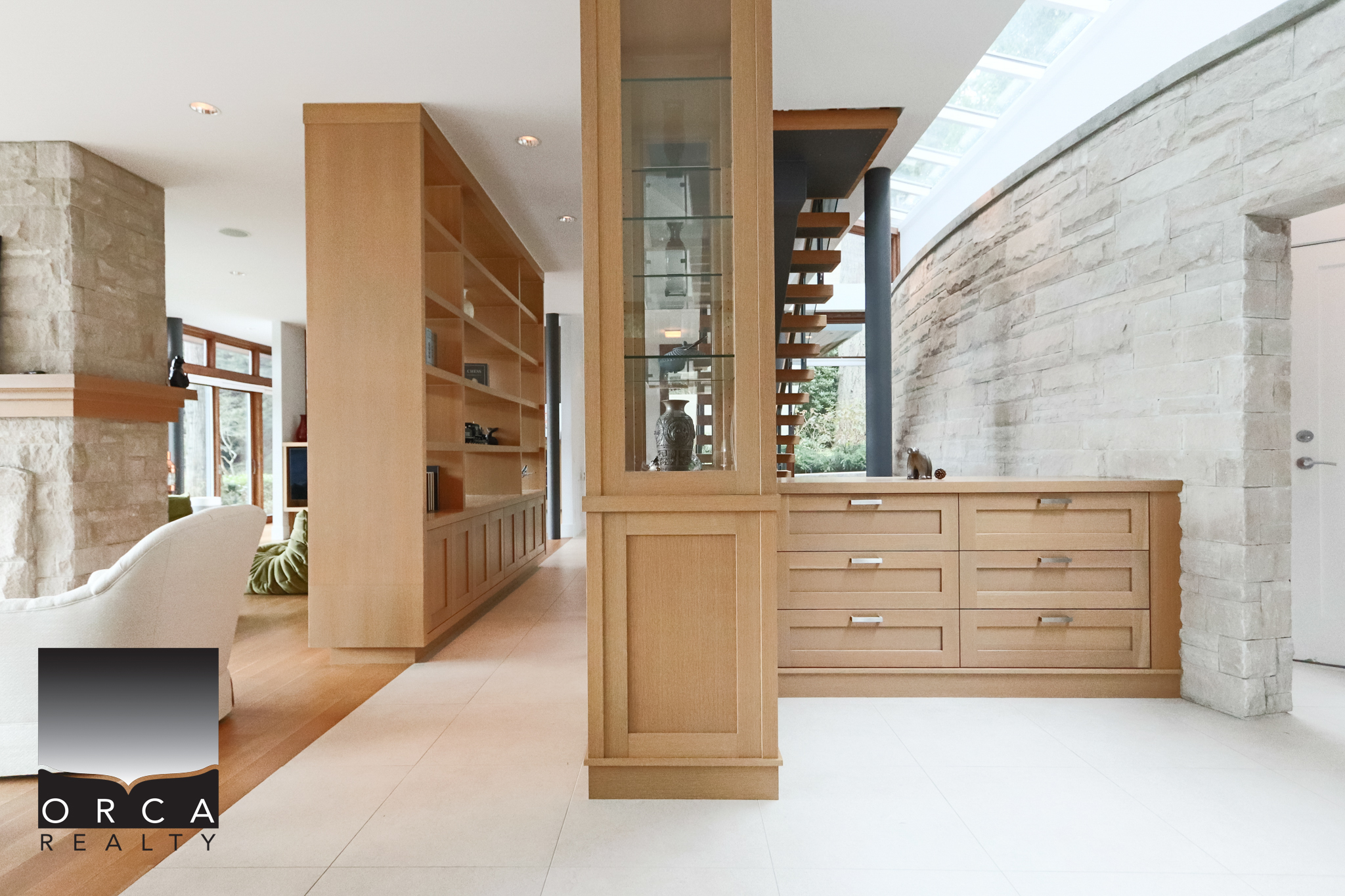 Modern West Vancouver Home Interior Elegant West Vancouver home interior with natural wood cabinetry and stone accents.