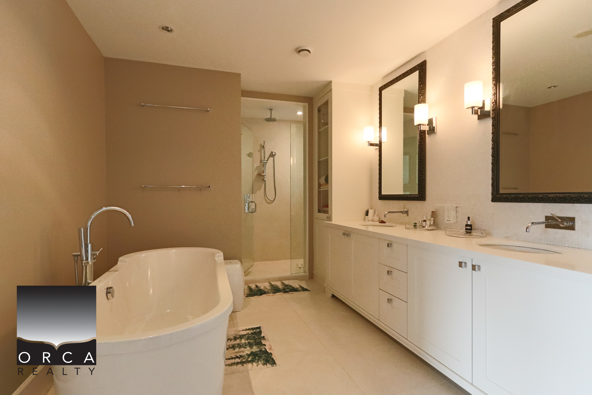 Luxury bathroom with modern fixtures and spacious design. Elegant West Vancouver bathroom featuring a soaking tub, double vanity, and walk-in shower.
