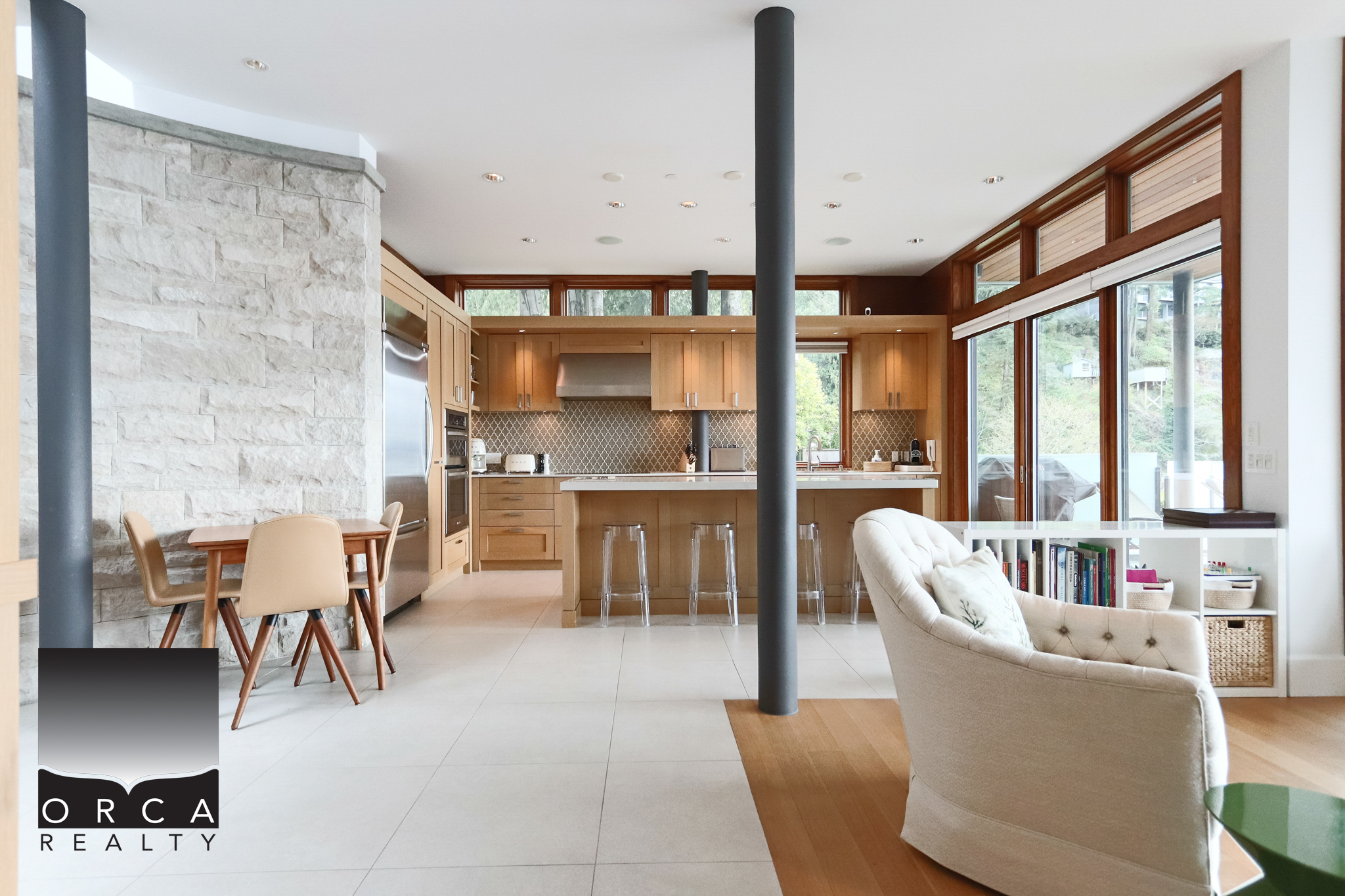Modern West Vancouver Home Interior Bright and spacious West Vancouver home interior with open-concept kitchen, large windows, and contemporary furnishings. Perfect for luxury living and family comfort.