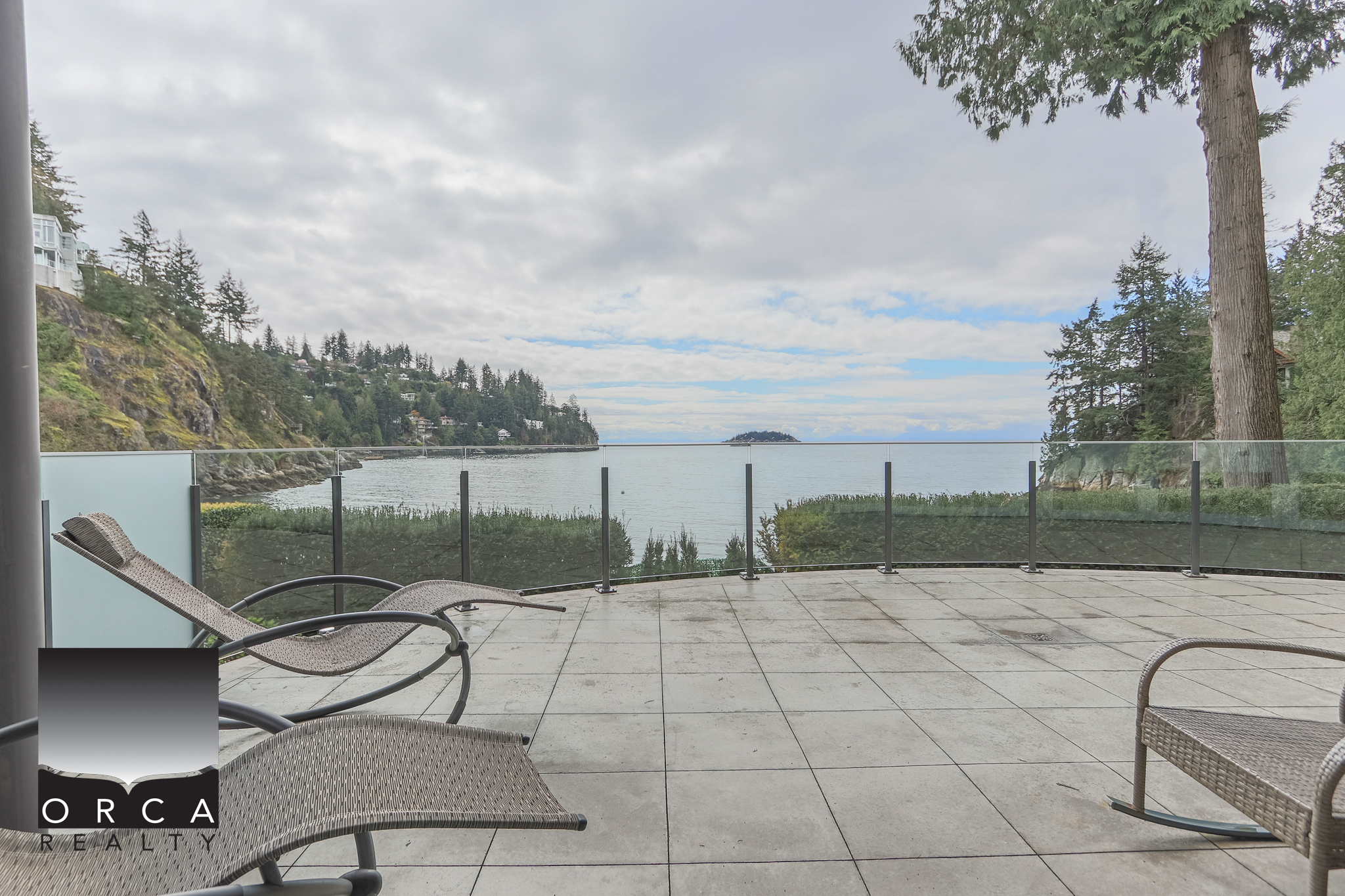 Stunning West Vancouver Waterfront View Beautiful waterfront view from a patio at 6780 Bachelor Bay Place, West Vancouver. Perfect for relaxing and enjoying scenic ocean vistas.