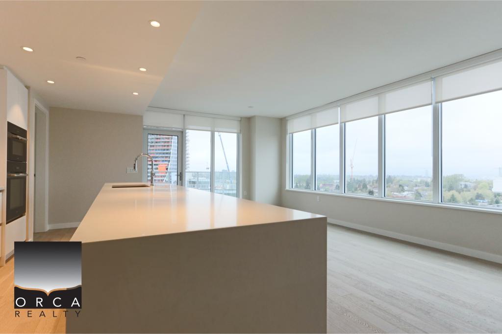 Spacious, bright high-rise apartment interior featuring large windows with panoramic city views, minimalist design, and contemporary finishes, ideal for luxury real estate listings.