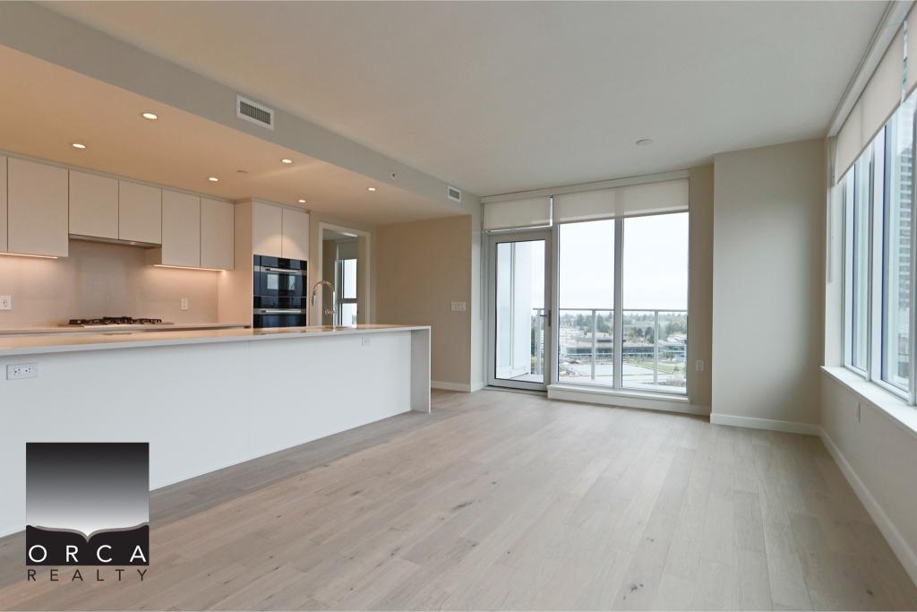 Bright and spacious open-concept apartment with large windows and city views in Vancouver. Perfect for urban living, featuring contemporary design and natural light.
