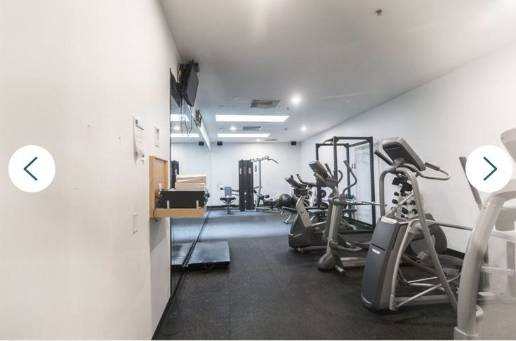 Interior view of a Vancouver gym with cardio machines and weight training equipment, ideal for fitness enthusiasts.